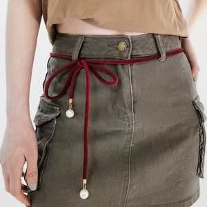 Deep red velvet skinny waist belt with white imitation pearls and gold buckle detail