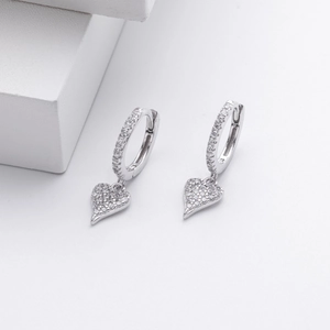 Close-up of S925 sterling silver heart earrings with sparkling cubic zirconia inlay