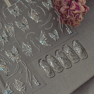 Holographic silver butterfly nail stickers with glitter and 3D embossed relief effect