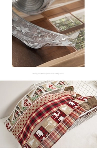 Close-up of festive Christmas ribbons with snowflake, reindeer and plaid patterns