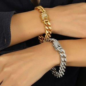 Iced out Cuban link bracelet set in gold and silver plating with full diamond zircon