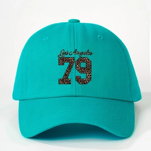 Retro Los Angeles 79 baseball cap in teal with leopard print text and curved brim