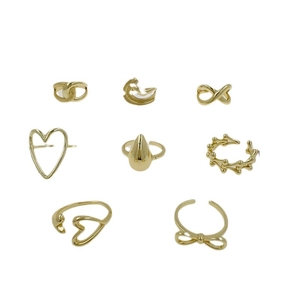 Set of 8 gold 18K plated rings featuring heart, teardrop, and infinity cutout designs