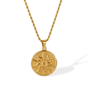 Gold stainless steel sun totem pendant necklace with twisted rope chain on white background