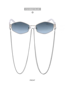Detail of gray blue hexagonal sunglasses with metallic chain and gold frames