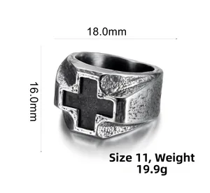 Detail view of retro stainless steel cross ring with 16mm height and textured finish