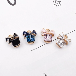 DIY bowknot crystal pendants set in black, blue, purple, and clear for earring making