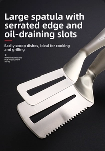 Macro detail of 304 stainless steel food tongs with serrated edge and oil filter holes