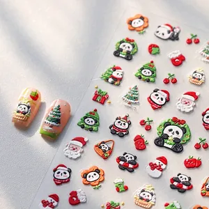 Detailed close-up of 5D embossed Christmas panda nail stickers with textured 3D holiday patterns