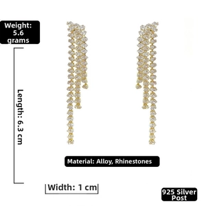 Detail view of 6.3cm gold tassel earrings with 925 silver pins and sparkling crystals