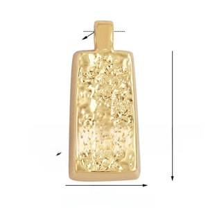 Macro detail of rectangular hammered metal pendant charm with 14x8mm dimensions