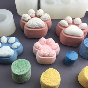 Silicone cat paw molds for DIY soaps and candles in pink blue and yellow colors