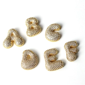 Fashionable gold-plated bubble letter pendants A-F fully paved with white cubic zirconia