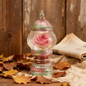 Detailed view of eternal pink rose inside iridescent vintage glass lamp mold ornament