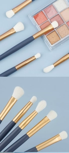 Macro shot of 5-piece blue eye makeup brushes with soft white bristles and gold ferrule