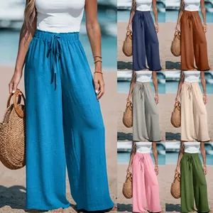 Detail view of cotton linen wide leg pants showing drawstring waist and various color options