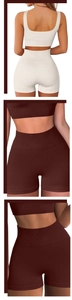 Detail of high-waist ribbed yoga shorts and U-neck tank top in white and dark coffee