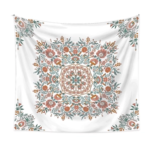 Mandala wall tapestry with orange floral patterns and teal leaves on beige background