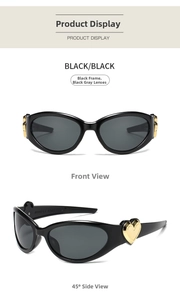 Detail view of JH18217 black sunglasses featuring large gold heart accents on the temples
