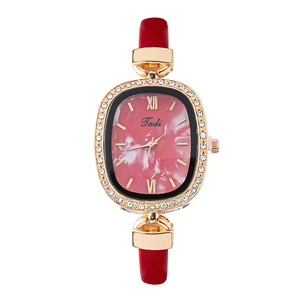 Women's quartz watch with red leather strap and sparkling crystal gold oval case