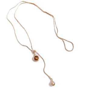 Retro brown resin heart pendant necklace with gold snake chain and polished gold ball