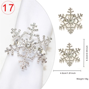 Detailed view of silver snowflake napkin ring with rhinestones and size measurements