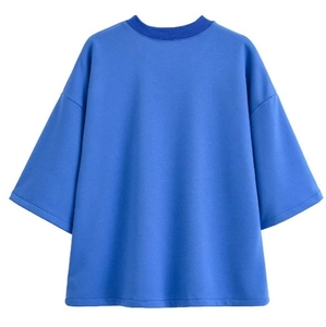 T-shirt oversize en coton bleu avec effet délavé et épaules tombantes, vue de l'arrière