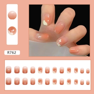 Peach gradient press-on nails with heart and dot patterns, 24-piece short round set