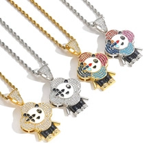 Macro shot of hip-hop iced-out flower pendants in gold and silver plating with zircon