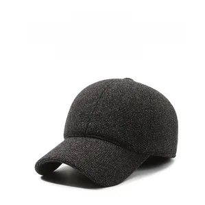 Detail of gray winter baseball cap featuring thick knit fabric and SPORT embroidery