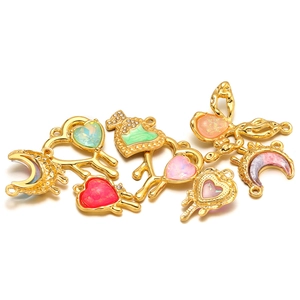 Golden heart and moon pendants set with colorful stones for DIY jewelry making