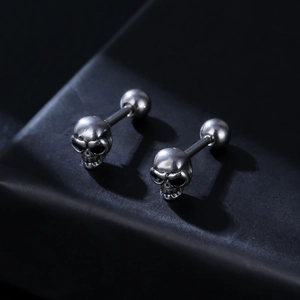 Punk style stainless steel skull stud earrings for men with polished silver finish