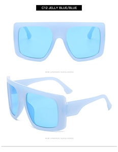 Front and side views of jelly blue oversized square sunglasses with matte frames