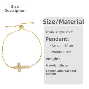 Detail of adjustable gold cross bracelet with zircon inlay and size measurements
