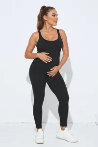 Close-up of seamless black maternity bodysuit showing high elasticity and U-neckline
