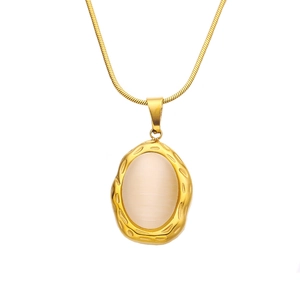 Vintage gold oval cat eye stone pendant necklace with hammered texture on snake chain