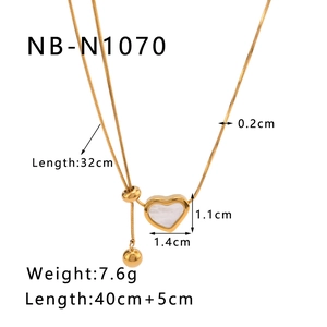 Detail showing dimensions of the 18k gold heart pendant with mother of pearl inlay