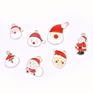 Detailed set of seven unique Santa Claus enamel charms with golden alloy borders