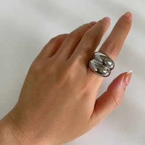 Polished silver wide chunky dome ring with a wave fold design for minimalist style