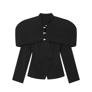Detail of elegant black blazer with a wide cape design and decorative gold buttons