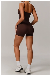 Detailed back view of dark brown yoga set featuring high-stretch ribbed fabric