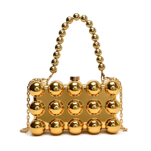 Luxurious gold metallic evening bag with spherical 3D texture and elegant chain strap