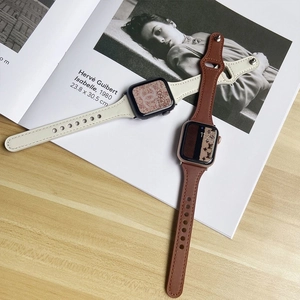 Slim leather watch strap for Apple Watch, stylish curved design, elegant fashion accessory.
