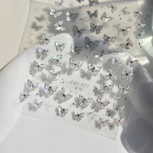 Detailed view of MS 571 butterfly nail stickers with laser finish and crystal accents