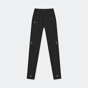 Detail view of high-waisted black yoga leggings with white cross print and matte finish