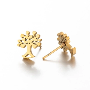 Macro shot of gold stainless steel tree of life stud earrings on a clean background