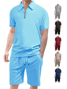 Detailed close-up of textured knit waffle fabric on summer short sleeve polo and shorts set