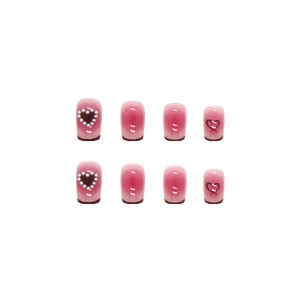 Pink gradient press-on nails set with pearl heart patterns and short square shape