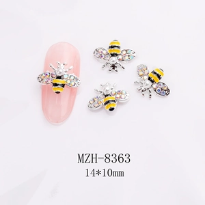 Detail of bee nail art charms with rainbow crystals, pearls and enamel, size 14x10mm