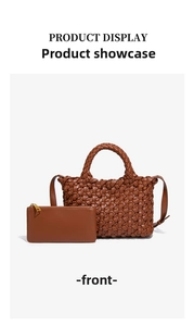 Detail of woven caramel leather tote bag with matching zippered pouch and shoulder strap